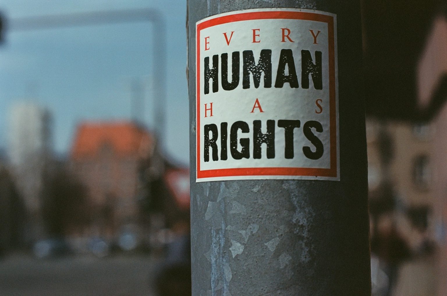 Poster on pole saying Every Human Has Rights